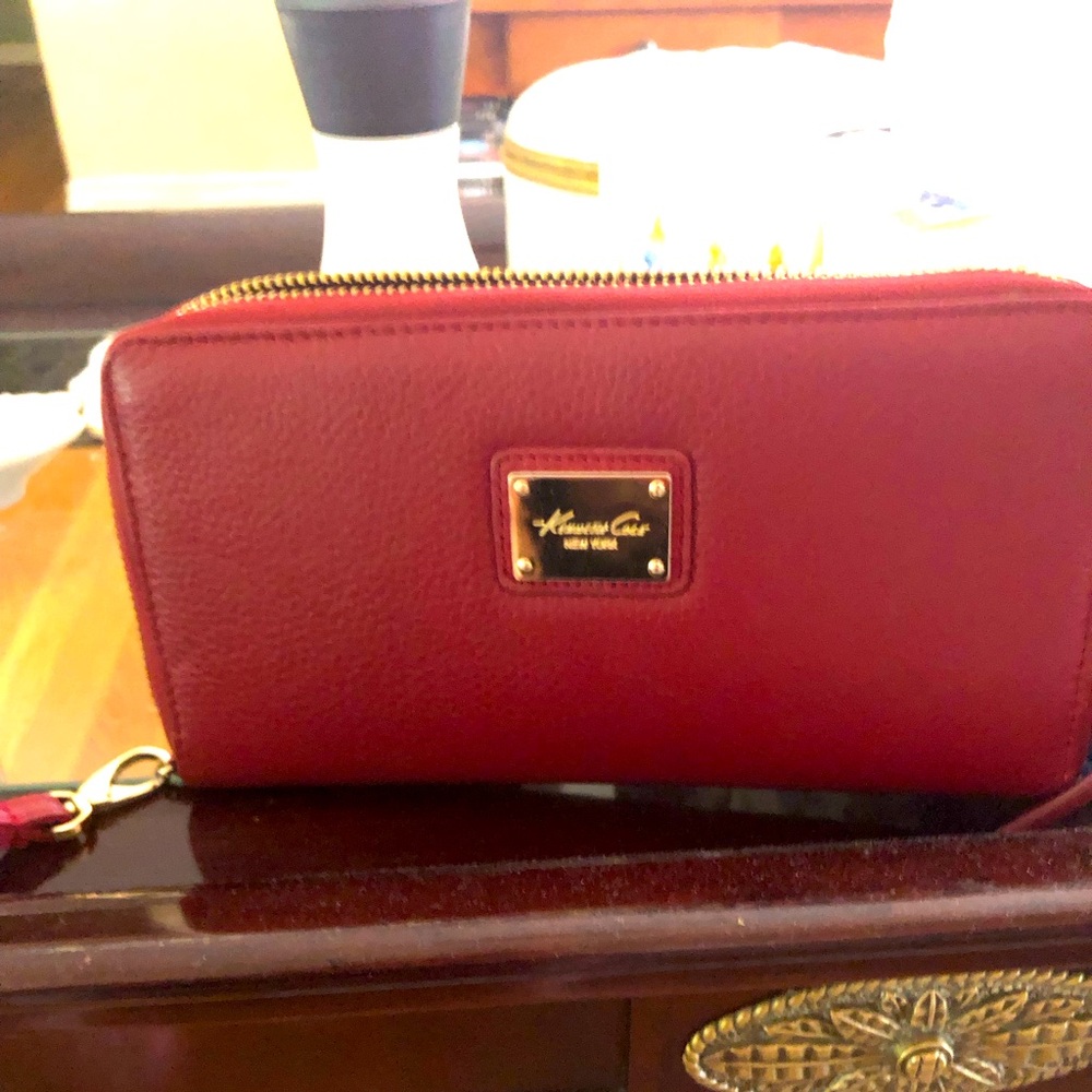Kenneth Cole deep red wristlet measures 4x8